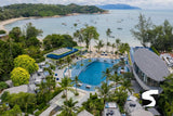 Aerial view of a beachfront resort pool overlooking Koh Samui bay